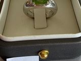 an image of a ring in a box with a price tag on it
