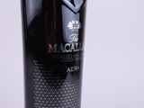 the bottle of macalla is sitting on a white surface
