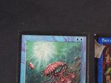 two cards that are sitting on a table