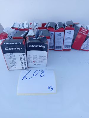 several boxes of commag products are sitting on a white surface