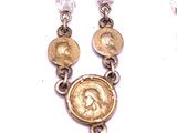 two necklaces with gold coins and crystal beads on a white background