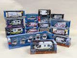 many different types of toy ambulances in the box