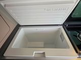 a cooler that is open on the table