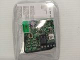 a small electronic device in a plastic case on a table
