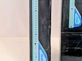 two black boxes that have a ruler on top of them
