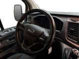 a car dashboard with a steering wheel and dashboard controls