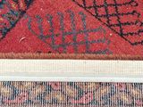 an image of a close up of a rug with a cat laying on it