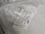 a plastic bag with a label on it sitting on a table