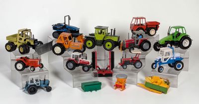 many different types of toy tractors on display