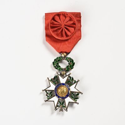 an image of a red ribbon with a star on top of it