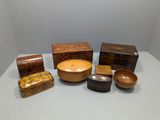 several different types of wooden bowls and bowls on a table