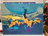 a picture of a painting on a table in a room