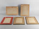 four different sized wooden picture frames with red frames on a white background