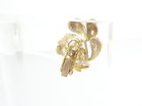 a close up of a gold ring with a lock on it