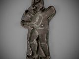 statue d'un homme tenant une épée dans la main droite