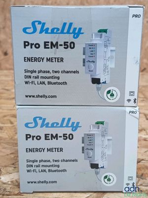 two boxes of energy meters sitting on a table
