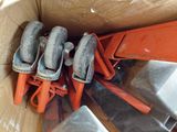 a lot of tools in a box on the floor