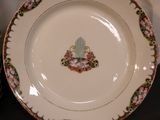two plates and a bowl on the table