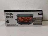 the box of the ninja crispi is sitting on the table