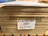 a stack of boxes that have a sign on it
