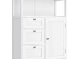 a close up of a white cabinet with drawers and drawers