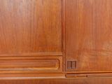 an image of a wooden bed with a headboard and foot board