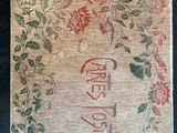 an old book with chinese writing on it sitting on a table
