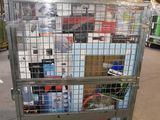 a large metal cart with a lot of items inside of it
