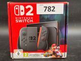 the nintendo switch console is in the box with the box open