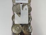 a box of cans of soda sitting on a table