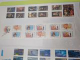 a lot of stamps that are on the table