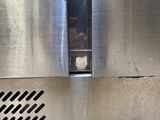 an image of a stainless steel oven with the door open