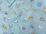 a blue shirt with a bunch of pokemons on it
