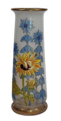 un vase en verre orné d'un motif de tournesol