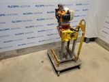 an image of a robot on a platform in a room