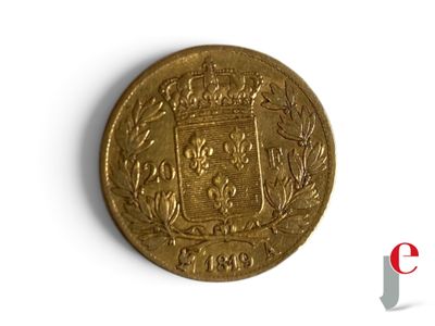 l'image d'une pièce d'or sur laquelle figurent des armoiries