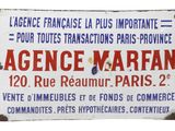 an old sign advertising a french business in paris