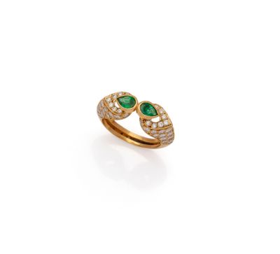 an emerald and diamond bypass ring, by van cleef