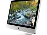 a computer monitor with a picture of a river on the screen