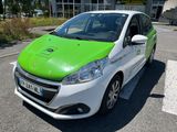 a green and white car that is parked in a parking lot