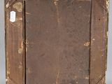 an old wooden picture frame sitting on top of a table
