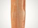 an image of a tall orange vase with a pattern on it