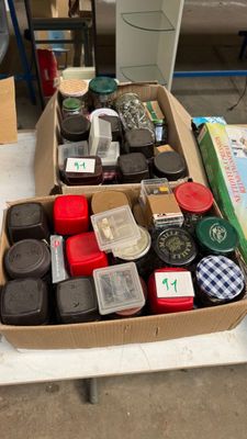 a box of assorted items sitting on a table