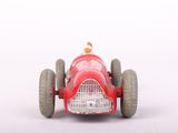 a red toy car with a bird on top of it