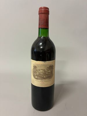 a bottle of wine that is sitting on a table
