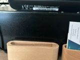 a small wooden box with a business card holder next to a printer