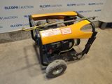 an image of a small generator is sitting on the floor