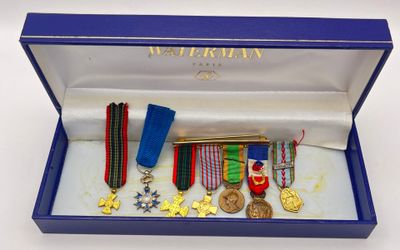 a blue box with medals and medals in it