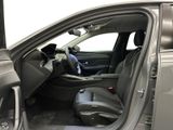 the interior of a car with the door open showing the driver ' s seat