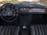 a car dashboard with black leather seats and a steering wheel